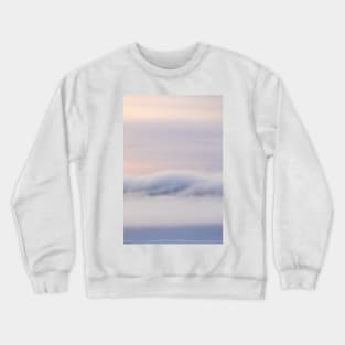 Dreamy thick fog at sunrise over hill Crewneck Sweatshirt